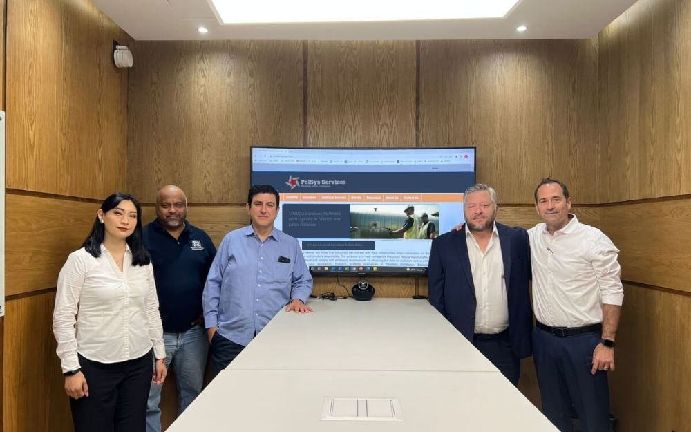 PolSys and Dysehs teams at conference table