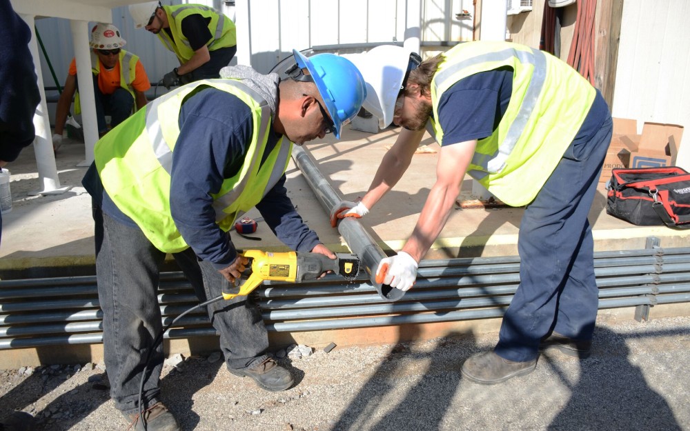 Technicians servicing a system