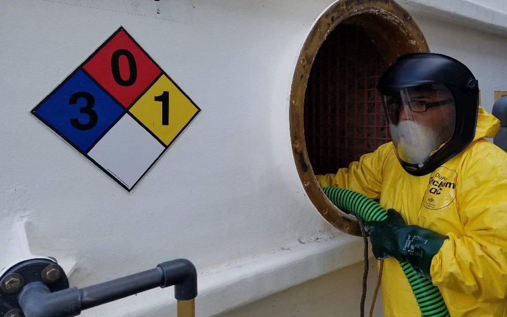 Field technician on-site cleaning wet scrubber