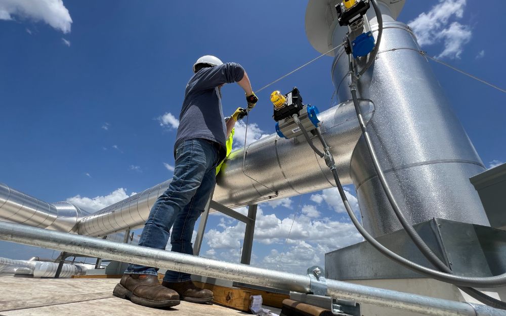 Technician working on upgrading a system